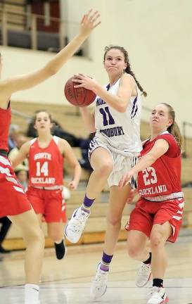 Freshman Olivia Shippee drives to the basket in the second half.