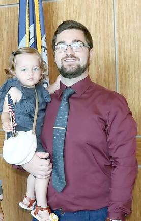 New citizen Michael Mikes and his daughter, Lia, at the Orange County naturalization ceremony on Thursday, Aug. 26. Mikes is from the Czech Republic and now lives in Monroe. Photo provided by the Orange County.