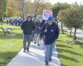 Monroe area residents walk during last year's Monroe CROP Hunger Walk around the millponds. This year's walk is scheduled for Sunday, Oct. 27.