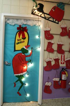 And this is the first-place Grinch decorated door.