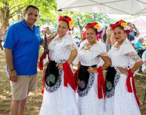 This year’s Hudson Valley Fiesta Latina at Museum Village takes place from 10 a.m. to 7 p.m. on Saturday, Aug. 19. Pictured here are scenes from previous festivals. Photo source: HudsonValleyFiestaLatina.com.