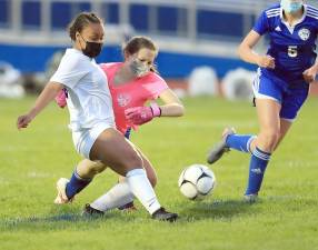 Kayla Harvey ties the score at one late in the first half. Photos by William Dimmit.