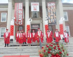 Above 13 of the 14 graduates of the George F Baker High School Class of 2020 in Tuxedo. One graduate pickup his red graduation box containing his diploma early due to other obligations.Photos by Frances Ruth Harris