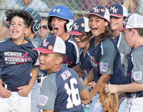 The MWLL 9-11U Team excited to celebrate “Big” Mike Zymberi’s two-run home run. Provided photos.