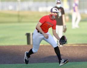 Ian Towns charges a ground ball over at third