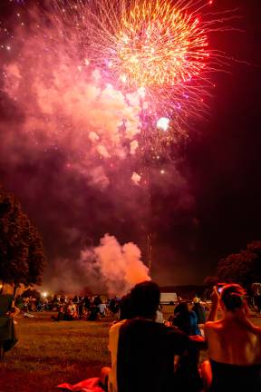The Annual Monroe Fireworks took place on July 3, 2026, despite ominous clouds, thunder, and lighting. The sky opened for a beautiful sunset before setting spectacularly prior to blastoff. Photos by Sammie Finch