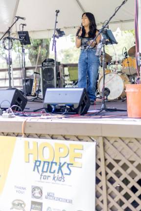 Bianca Mangonon of Monroe got Talent performs at Hope Rocks for Kids benefit.