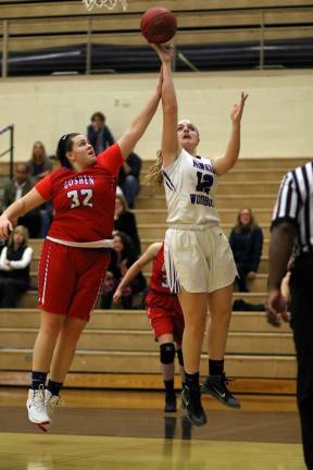 Jamie Waldron (#12) scores two of her game-high 19 points.