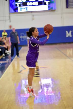 Brianna Taveras, #24, gets off a 3-point shot in the first half.