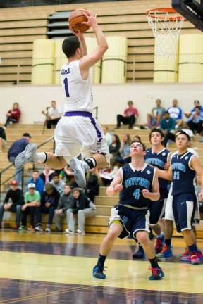 Guard Kevin Carr pays homage to former Knick Dick Barnett with this jump shot at Suffern last weekend.