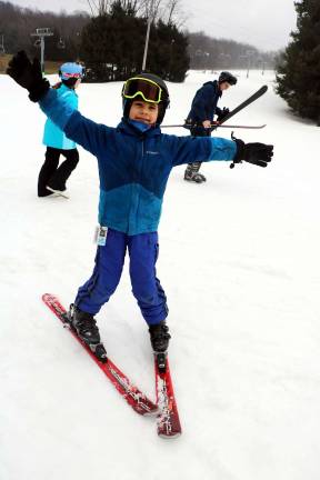 Photos by Roger Gavan Alex Irimina, 6, enjoys the opening day of the 2018-19 ski season at Mount Peter Ski Area.