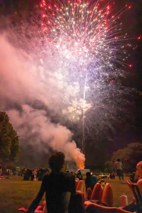 The Annual Monroe Fireworks took place on July 3, 2026, despite ominous clouds, thunder, and lighting. The sky opened for a beautiful sunset before setting spectacularly prior to blastoff. Photos by Sammie Finch