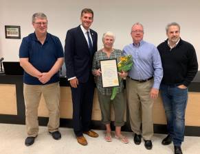 Assemblyman Colin J. Schmitt (R,C,I-New Windsor) presented Carol Herb of the Village of Woodbury an official New York State Assembly Citation as a surprise with the Village Board to honor her service to the community. Carol Herb has served as the Village Tax Collector for more than 30 years and is known for her volunteerism with the PTA and Woodbury Senior Center. Pictured from left to right are: Woodbury Village Mayor Michael Queenan, Assemblyman Schmitt, Carol Herb, Village Trustee Thomas Flood and Village Trustee Andrew Giacomazza.