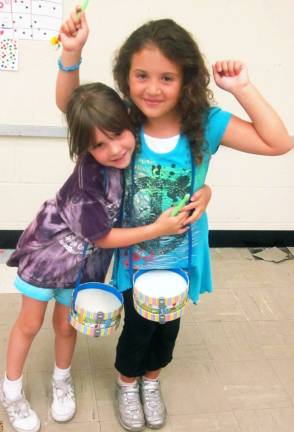 Ilana Melillo, 6, of Monroe and Maya Reich, 6, of Highland Mills are excited to perform in the Music Mitzvah Video.