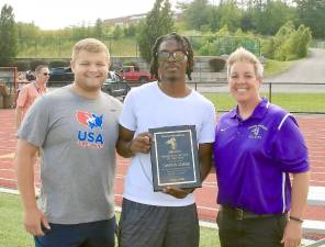 Cam Adams receives Senior Male Athlete of the Year Award from Coach Robert Kelly and Athletic Director Lori Hock. Photos by William Dimmit.