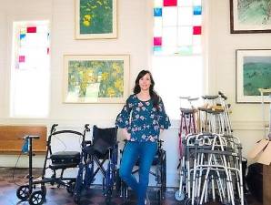 Tuxedo Town Clerk Marisa Dollbaum amid collected supplies