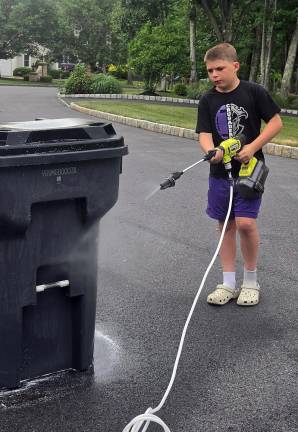 Monroe-Woodbury student Jaxson Behr started Splash Kid, a trash and recycling bin cleaning business.
