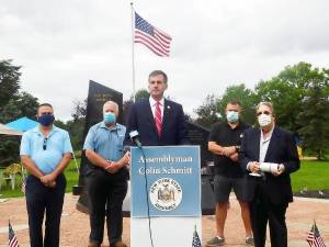 Assemblyman Colin J. Schmitt announced July 16,that Allan Markoff, president of New York Security Systems, Inc., has donated a video monitoring system at no cost to the Village of Washingtonville to protect the recently vandalized Washingtonville 9-11 memorial. Pictured from left to right are: Steve Gelmes, director of Technical Services New York Security Systems, Inc., Washingtonville Deputy Mayor/Village Trustee Paul Lang, Assemblyman Schmitt, John Salka, president of Washingtonville Firefighters World Trade Center Memorial, and Allan Markoff, president of New York Security Systems. Photo provided by Jena Knight.