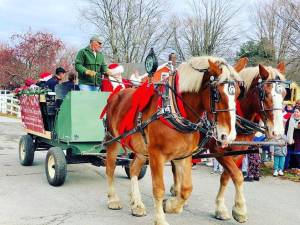 Santa making the trip to Museum Village during last year’s holiday season.