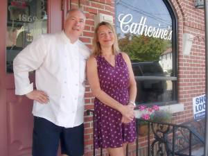 Chef Stephen Serkes and his wife, Jennifer, pose in front of their restaurant, Catherine’s, located at 153 West Main Street in Goshen. The restaurant has been serving fresh healthy meals to patrons since 1991, celebrating a 30-year anniversary on May 15, 2021. Photo by Geri Corey.