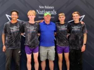 The M-W Boys Distance Medley Relay team of Ronaldo Rodriguez Perez, Collin Gilstrap, John Urciuoli and Collin Catherwood with Coach James Glover.