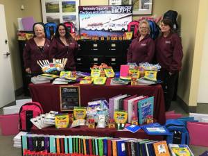Pictured from left to right are Nebrasky employees Michelle Ross, Leeanne Rose, Judy Yates and Eileen Barclay with the donated school supplies