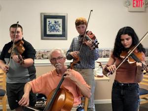 From left to right Jack Sheehy, Viktor Prizgintas (seated), Oliver Jibb and Valerie Taveras