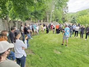 A group of Tuxedo Park residents gathered in front of the American Flag located in front of the police station on behalf of the late George Floyd Tuesday evening. Photo provided by Mayor David McFadden.