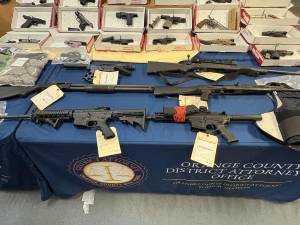 Guns, drugs and money confiscated as part of Operation Powder Burn.