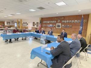 Assemblyman Colin Schmitt, seventh from left, hosted a roundtable on PTSD in New Winsor, where he lives. Provided photo.