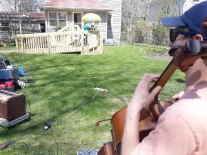 Alex Prizgintas performing a special “Thank You Concert” for Bob Curtis (safely from a distance) at his home in Highland Mills.