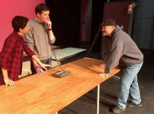 Brian Petti, right, is seen here working with Jay Smith and Jason Garfinkel for his play.