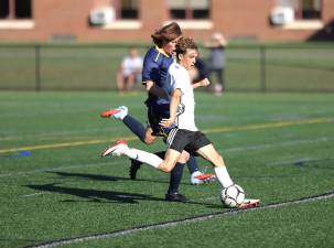 Crusader Klement Bujaj (in white jersey) scored on this shot with 26 seconds left in the half to tie the score.