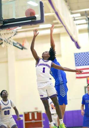 Jayden Desir, #1, led the Crusaders’ attack with 17 points in the game.