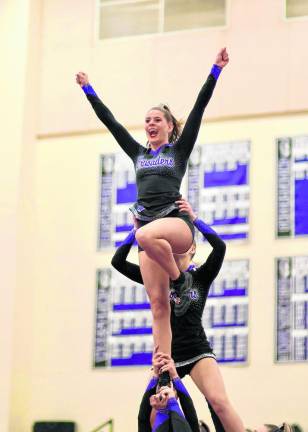 Angela Pirraglia shows that championship Crusader spirt during the team’s performance.