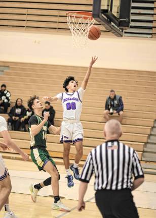 Jason Ramirez, #00, drives and scores in the first quarter.