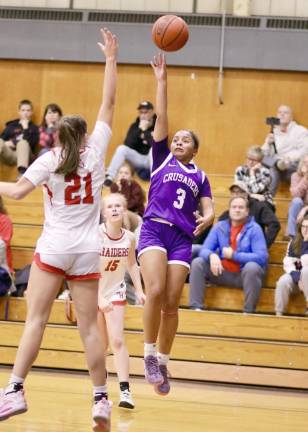 Madison Fileen, #3, led the Crusaders with 12 points in the game.