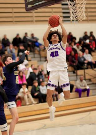 Jankarlos Mendoza, #40, drives to the basket in the second half.