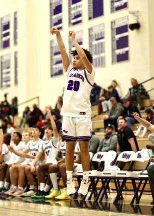 Nicolas Sanchez, #20, hits a big 3-point shot in the fourth quarter.