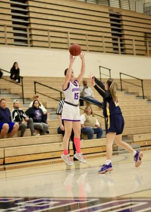Brenna Quinn, #15, hits the game winning 3-point shot with :52 left in the game.