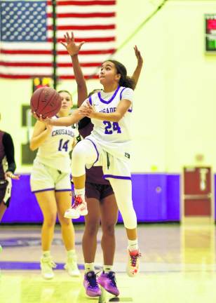 Brianna Taveras, #24, makes a quick move to the basket.