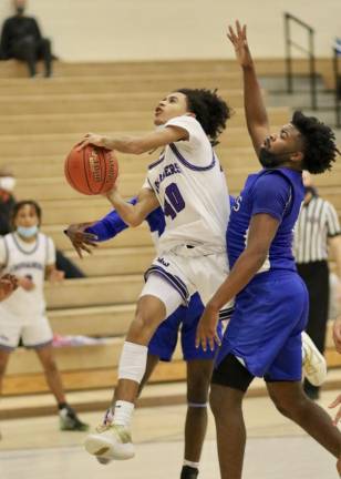 Jankarlos Mendoza, #40, slices his way thru the Middies defense.