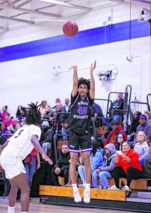 Jankarlos Mendoza, #40, launches a shot in the second quarter.