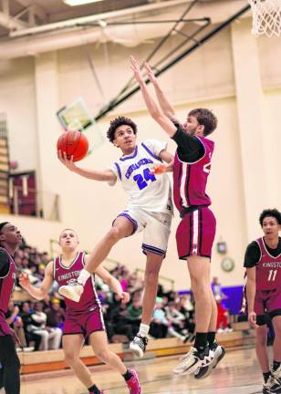 CJ Pearson, #24, drives past a Tiger defender.