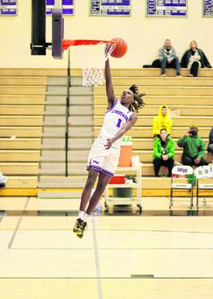 Jayden Desir, #1, scores in the first quarter.