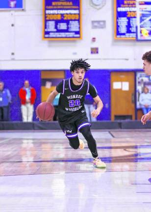 Nick Sanchez, #20, led the Crusaders’ offense, scoring 24 points with seven 3-point shots.