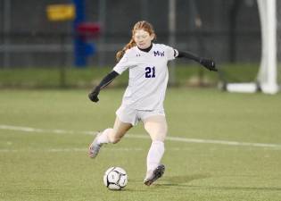 Emily McGee, #21, playing on the back line this year, has helped the Crusaders record 9 shutouts.