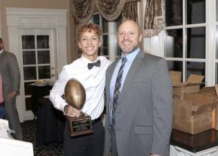 Quincy Banker, winner of the Jim Hintze “Special Teams Player of the Year Award,” with Head Coach James Sciarra
