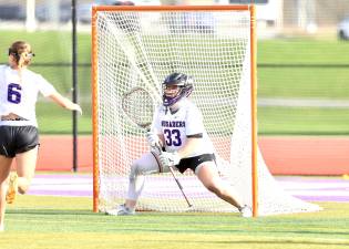 #33, Crusader Goalie Lilly Crowley kept the team in the game with several key saves.
