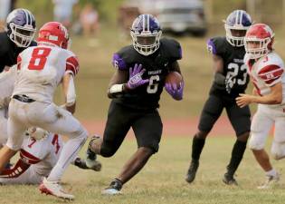 Eryk Shammgod, #6, crashed through the Raiders for 153 yards and 2 scores.